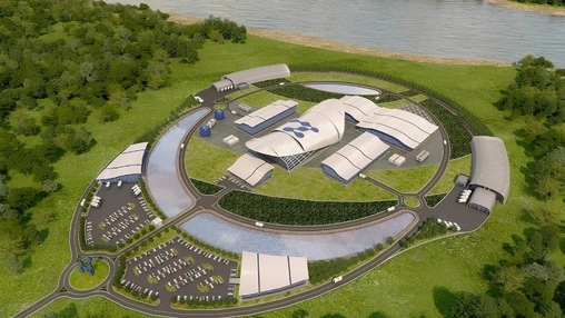 Aerial render of a nuclear SMR campus with a circular road, central building cluster, and green landscape